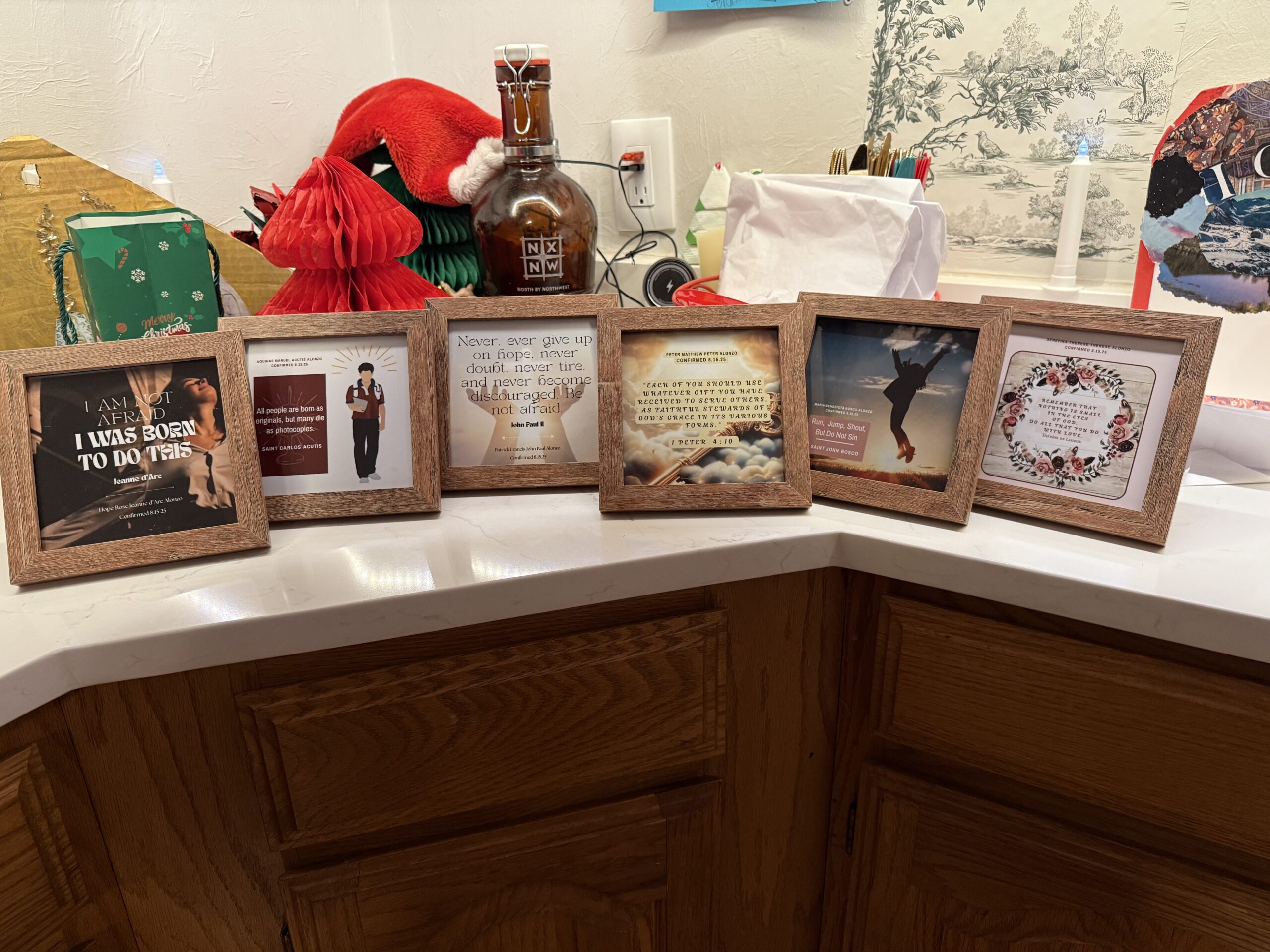six frames on a countertop with various religious images